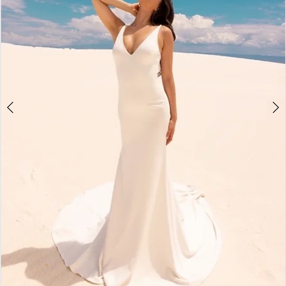 Wedding dress by Jimme Huang never been worn. beautiful crystal belt included.